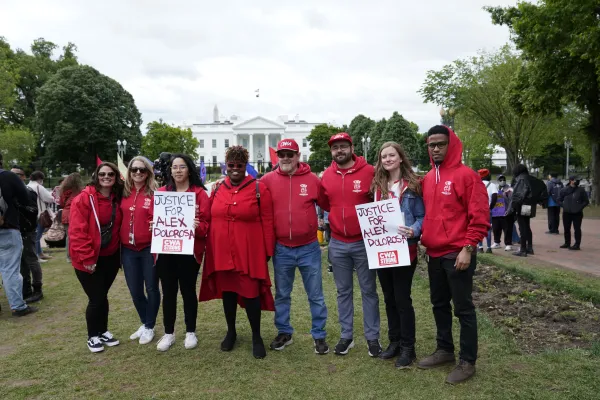 CWA representatives holding Justice for Alex Dolorosa signs at the White House 