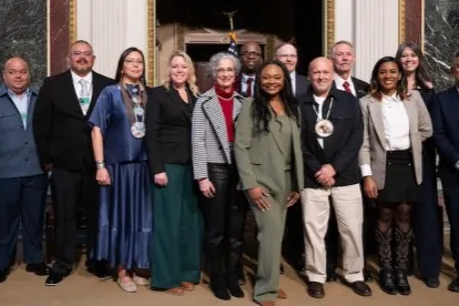 CWA member and others standing at White House Rural Innovators Event
