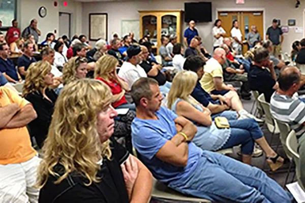 crowded_public_hearing.png