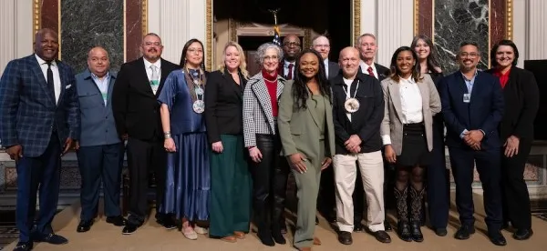 CWA member and others standing at White House Rural Innovators Event